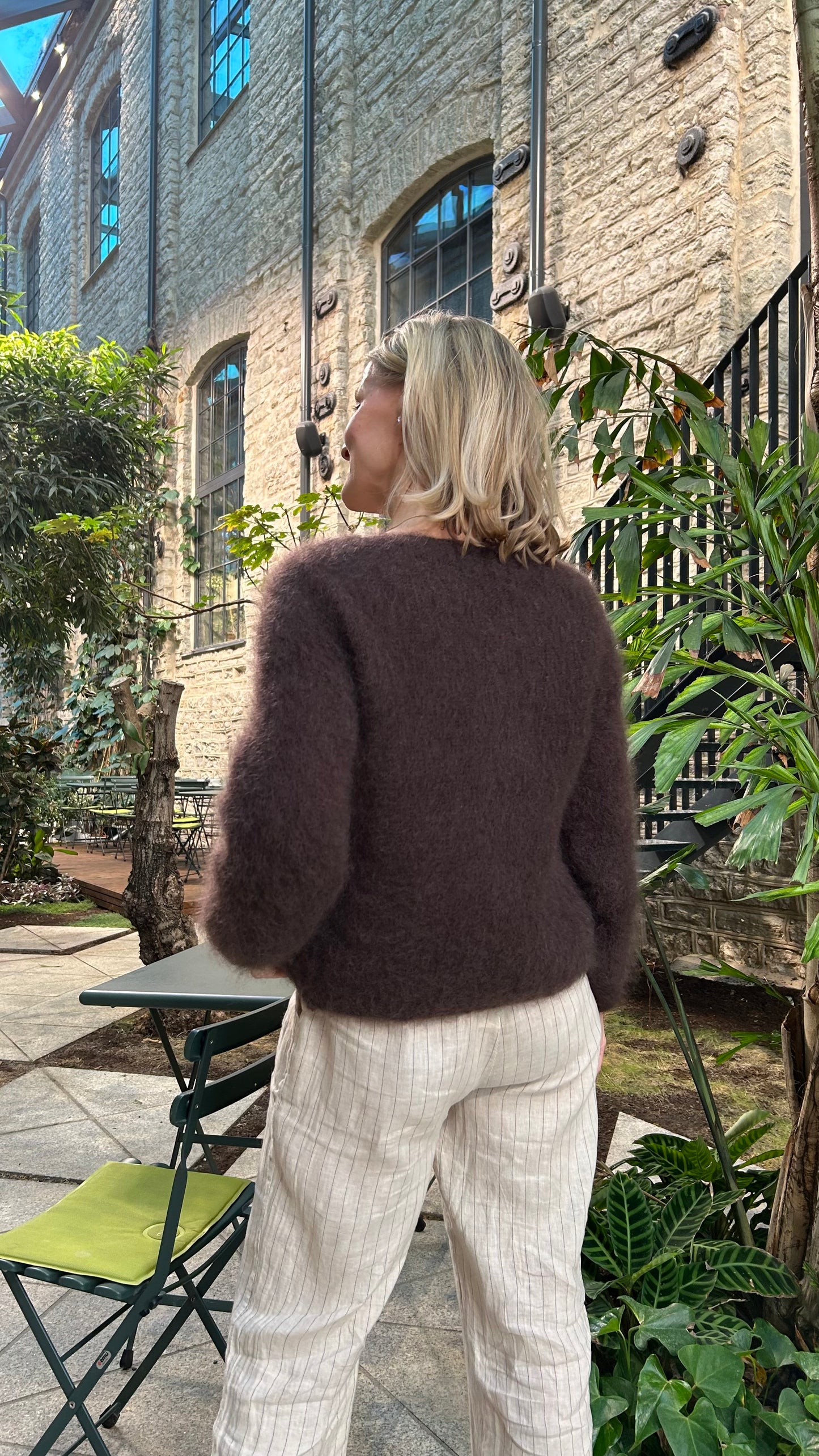 Women wearing brown fluff 80% kid mohair cardigan